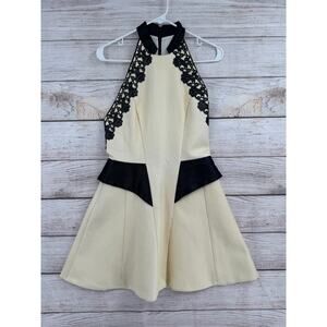 Manning Cartell Enamel Peplum Crochet Cocktail Dress Womens 10 Cream Black NEW